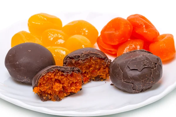 Cumquat stuffing chocolate candies — Stock Photo, Image